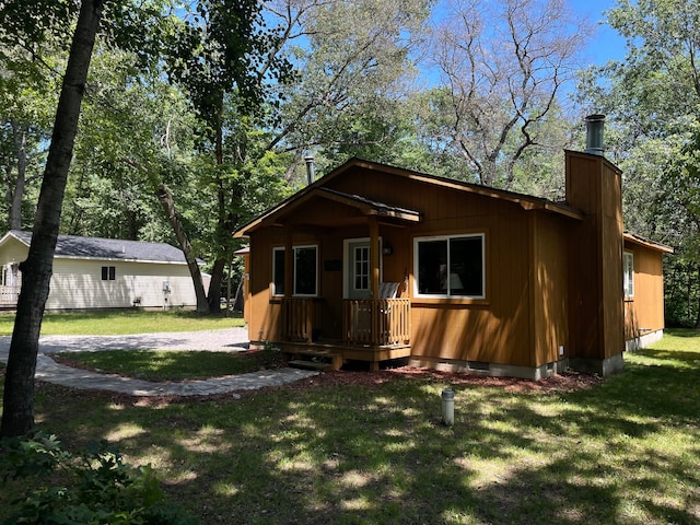 exterior space featuring a front lawn