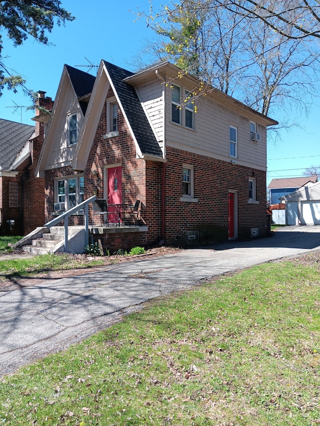 exterior space featuring a garage and an outdoor structure