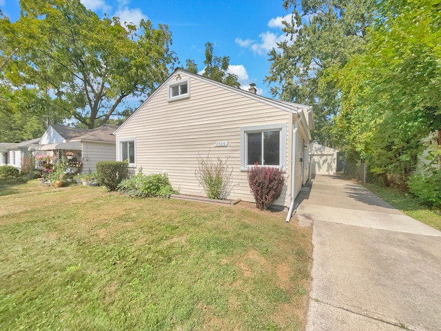 view of property exterior featuring a yard