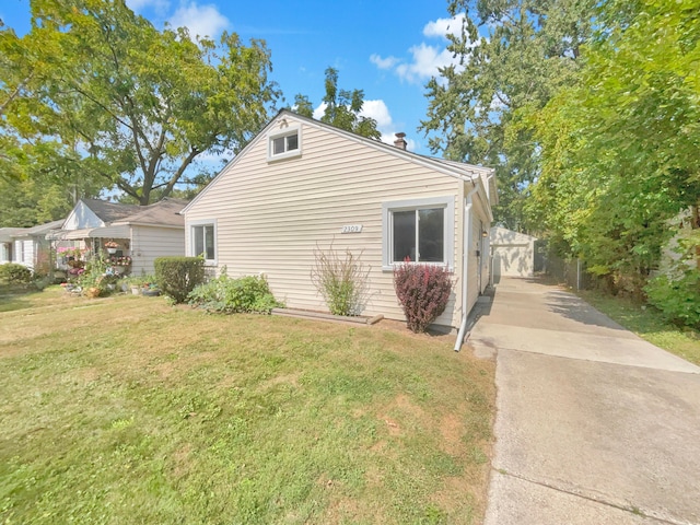 view of home's exterior featuring a yard