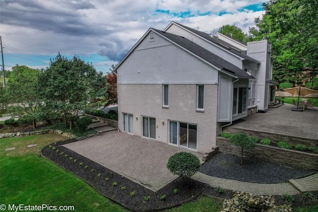 rear view of property with a patio area