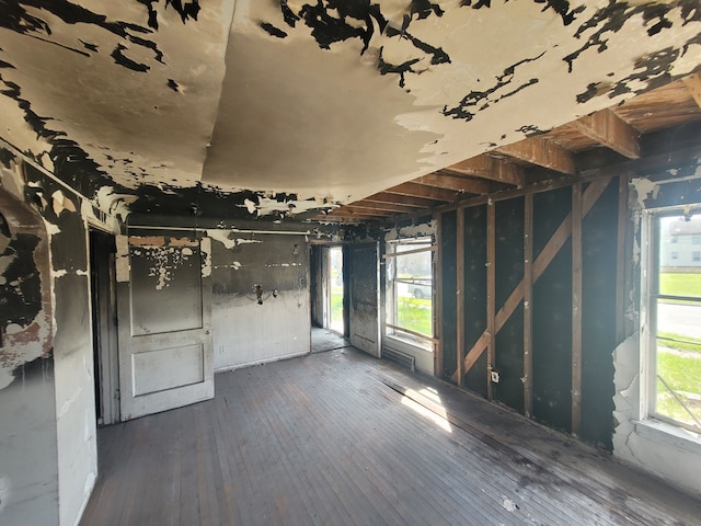 empty room with dark wood finished floors