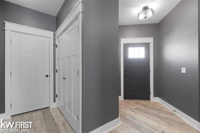 foyer with light wood-type flooring