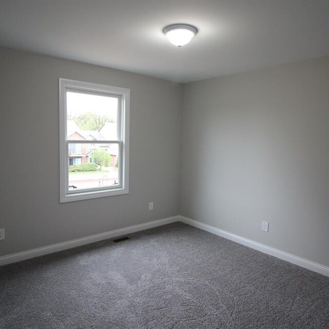 33690 N Bostwick, Farmington Hills, MI 48335 - carpeted spare room with baseboards