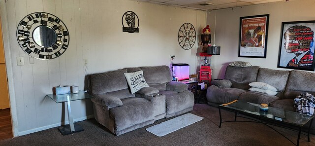 1299 Sand Beach Rd, Bad Axe, MI 48413 - carpeted living room featuring a drop ceiling and baseboards