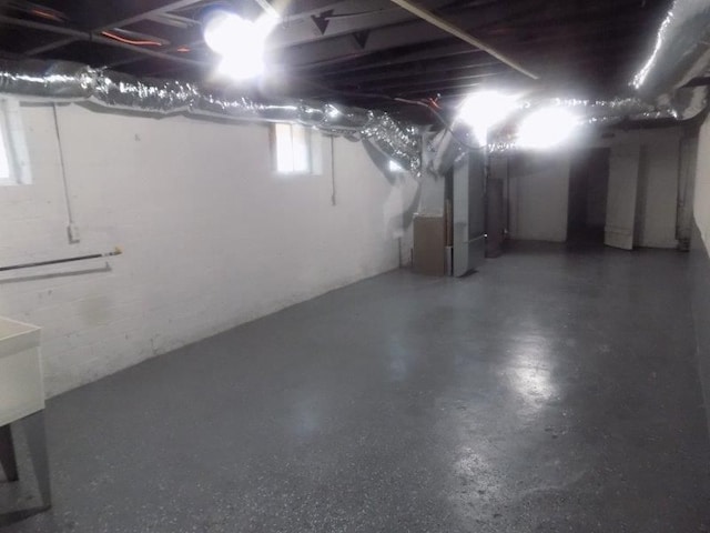 basement featuring heating unit