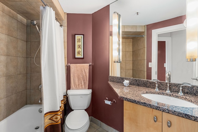 full bathroom with shower / bath combination with curtain, vanity, toilet, and tile patterned floors