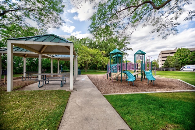 view of play area featuring a lawn and a gazebo