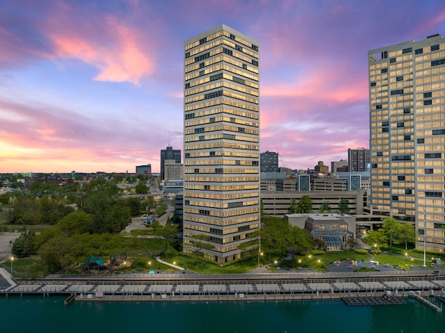 property's view of city featuring a water view