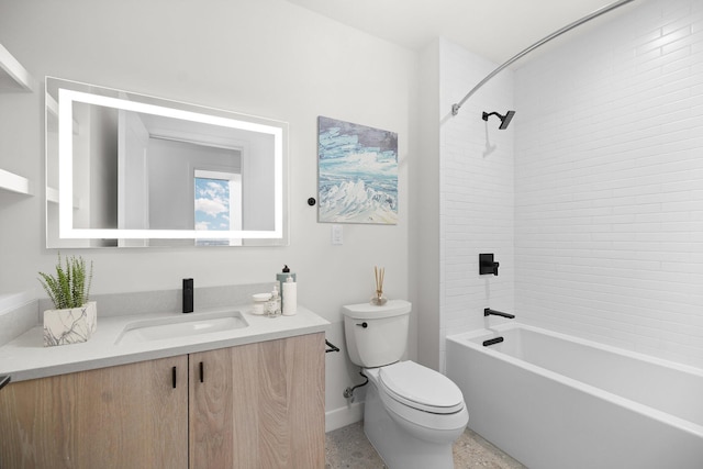 full bathroom featuring vanity, toilet, and tiled shower / bath