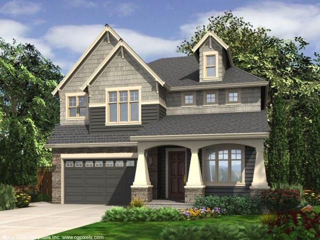 craftsman-style house with a garage and a front yard