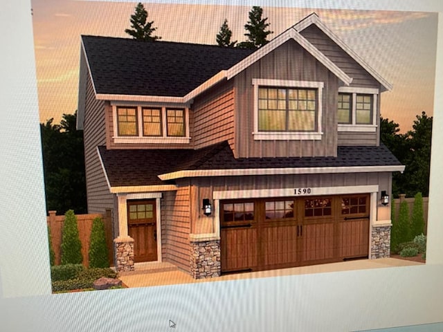 craftsman-style home featuring a garage