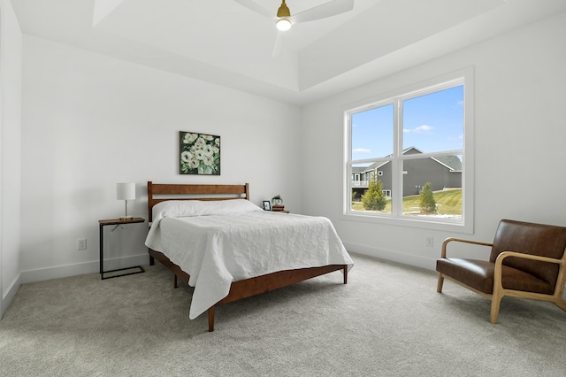 bedroom with light carpet and ceiling fan