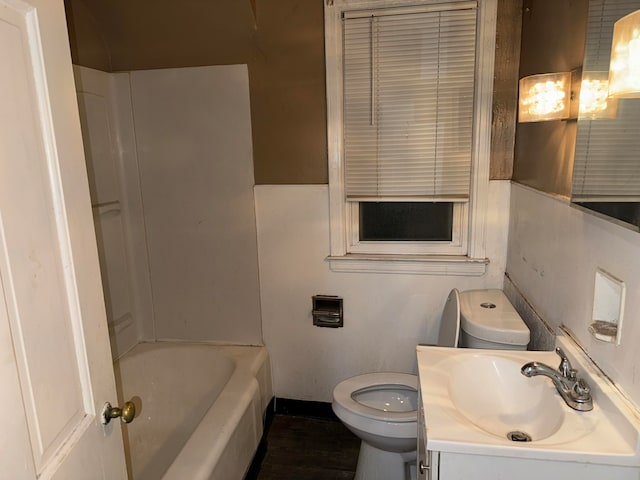 full bathroom with vanity, shower / bathtub combination, and toilet