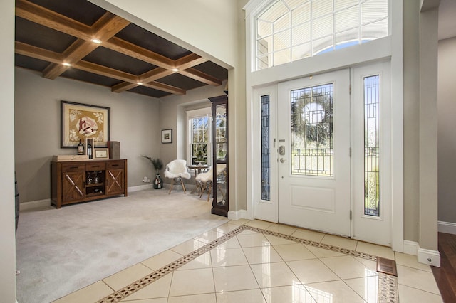3975 Harbor Breeze Dr, Norton Shores, MI 49441 - entryway with plenty of natural light, beamed ceiling, baseboards, and coffered ceiling