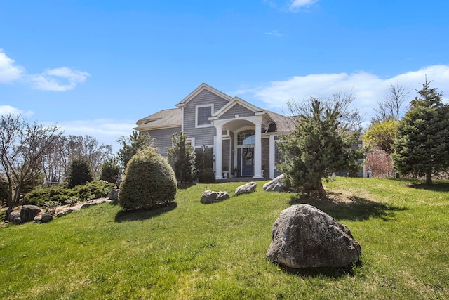 3975 Harbor Breeze Dr, Norton Shores, MI 49441 - view of front of home featuring a front lawn