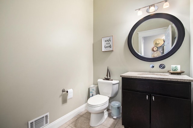 3975 Harbor Breeze Dr, Norton Shores, MI 49441 - bathroom with toilet, vanity, tile patterned floors, and baseboards