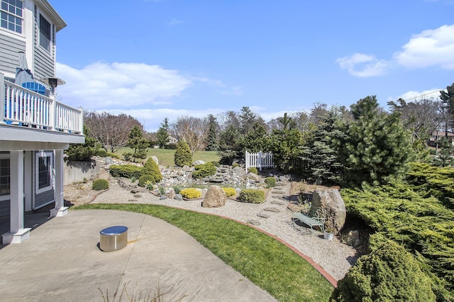 3975 Harbor Breeze Dr, Norton Shores, MI 49441 - view of yard with a patio area and a balcony