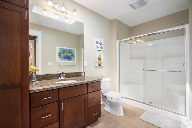 3975 Harbor Breeze Dr, Norton Shores, MI 49441 - full bath featuring a shower stall, tile patterned floors, vanity, and toilet