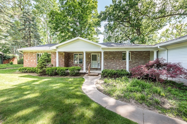 ranch-style home with a front lawn