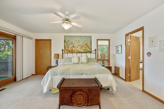 bedroom featuring multiple windows, ceiling fan, light colored carpet, and access to exterior