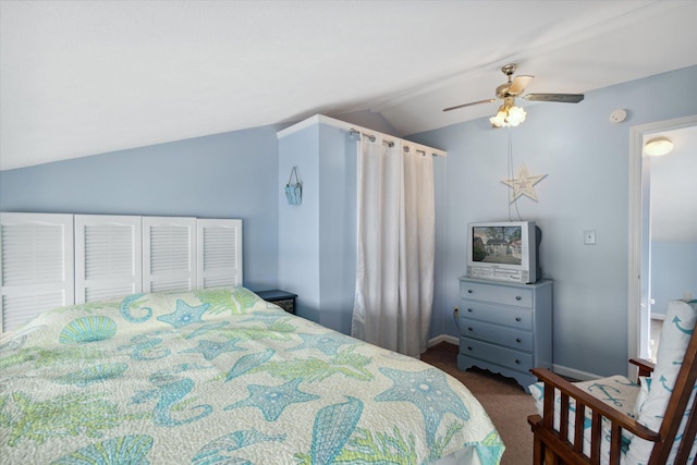 bedroom with ceiling fan, carpet floors, and lofted ceiling