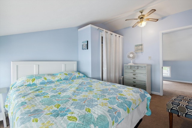 bedroom featuring carpet floors, ceiling fan, and lofted ceiling