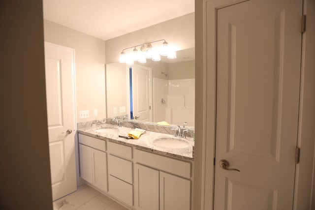 bathroom featuring vanity and walk in shower