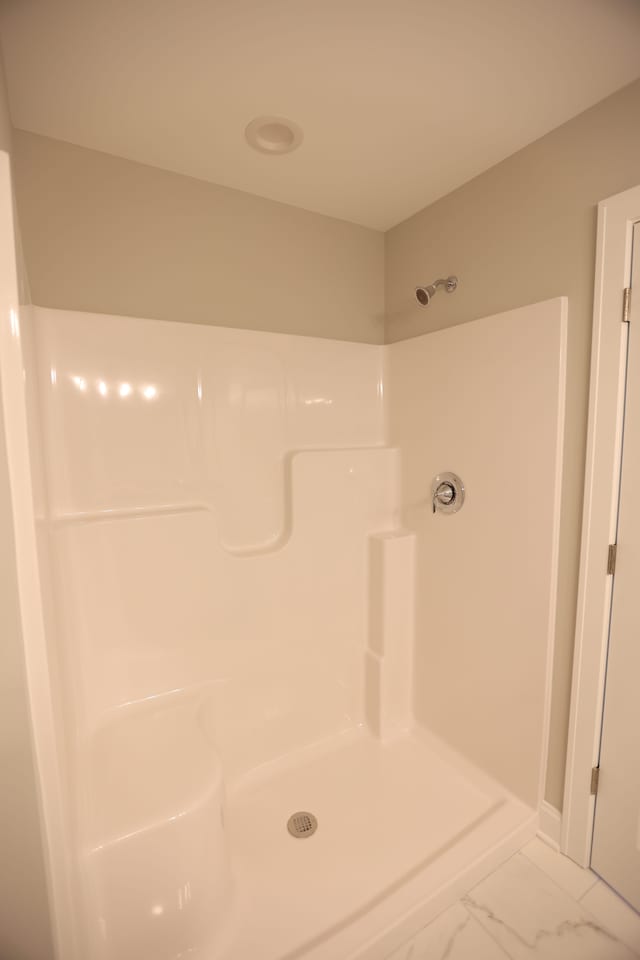 bathroom with walk in shower