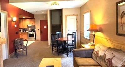 5900 Water Rd Unit 319, Rothbury, MI 49452 - view of carpeted dining space