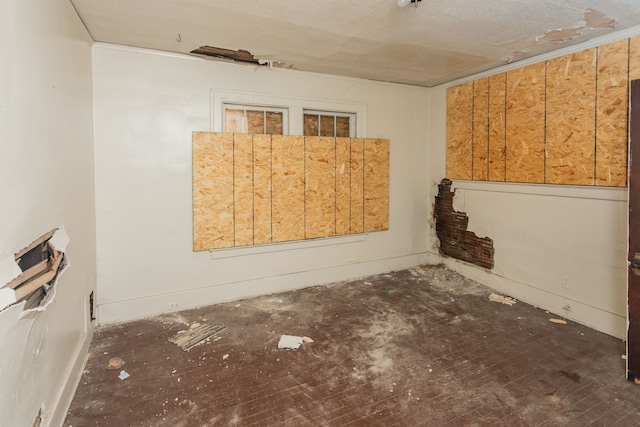 empty room with a textured ceiling