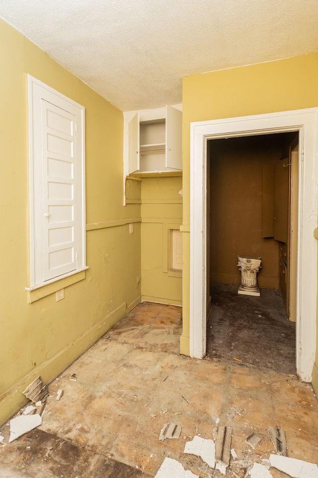 bathroom featuring a textured ceiling