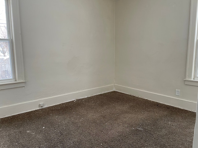 spare room featuring carpet flooring