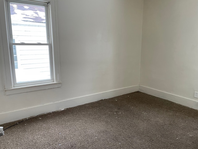 view of carpeted spare room