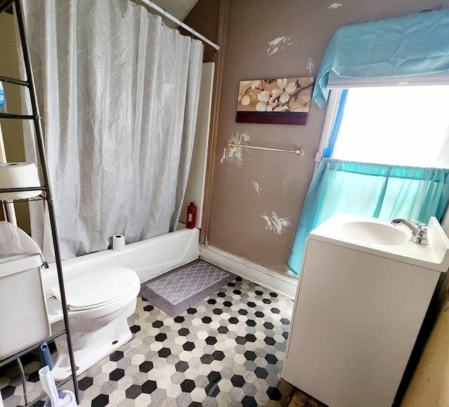 full bathroom featuring vanity, toilet, and shower / bathtub combination with curtain