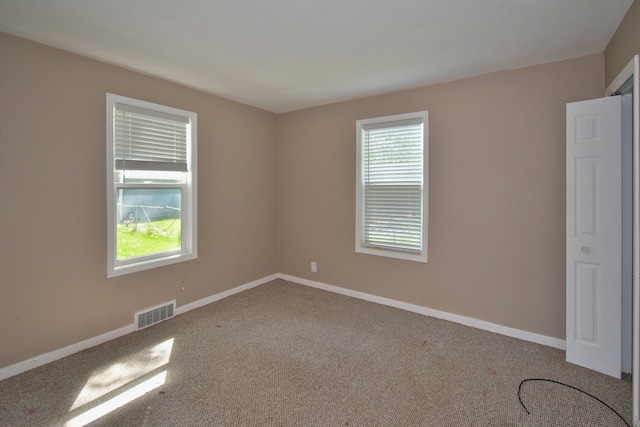 view of carpeted spare room