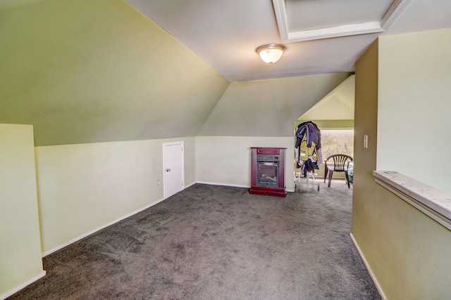 bonus room with carpet floors and lofted ceiling