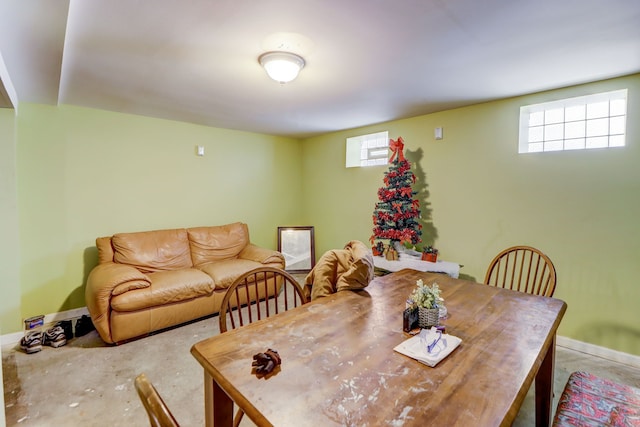 dining area with concrete floors and plenty of natural light