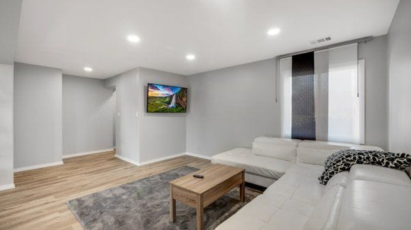 living room with light hardwood / wood-style floors