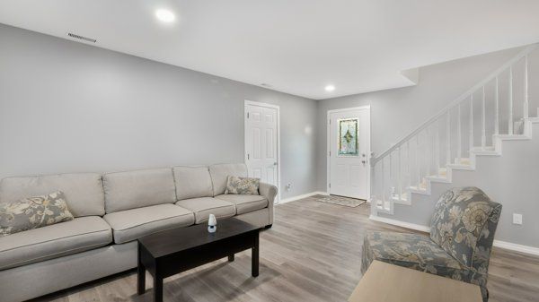 living room with hardwood / wood-style flooring