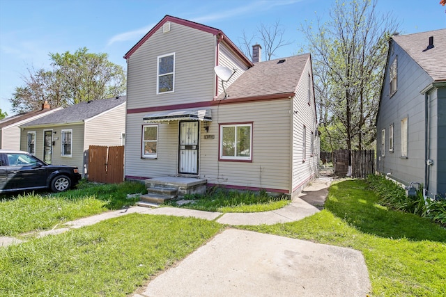 view of front of house with a front lawn