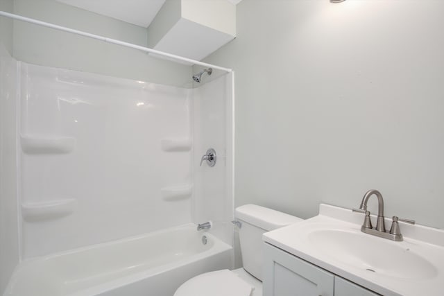 full bathroom featuring bathtub / shower combination, vanity, and toilet