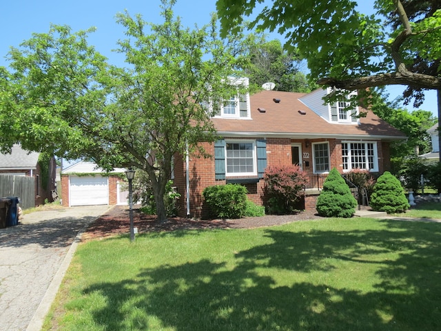 new england style home featuring a front lawn