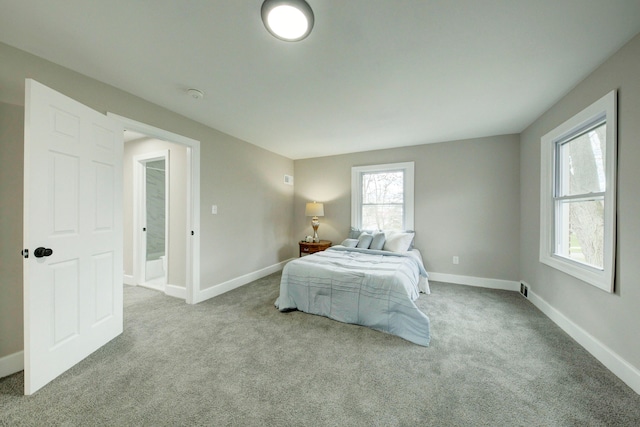 bedroom with light carpet