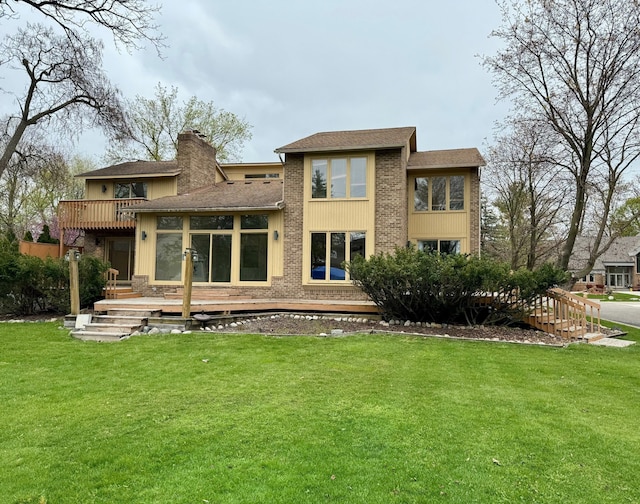 back of property with a sunroom and a yard