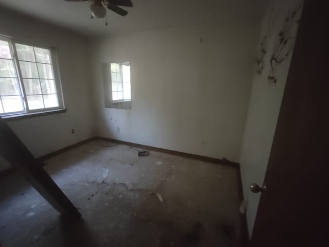 spare room with ceiling fan