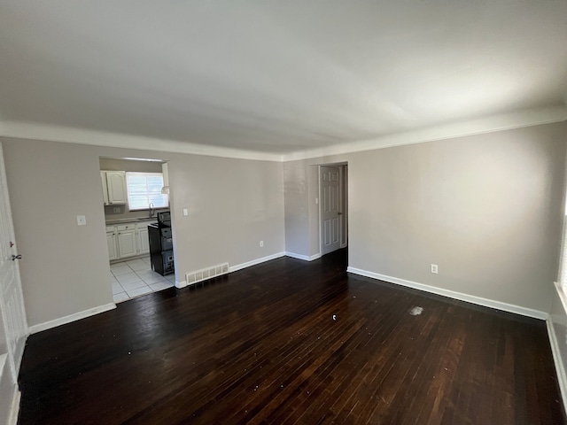 unfurnished room with light hardwood / wood-style floors