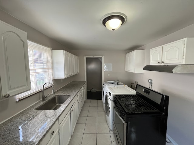 kitchen featuring white cabinets, ventilation hood, sink, light stone countertops, and light tile patterned floors