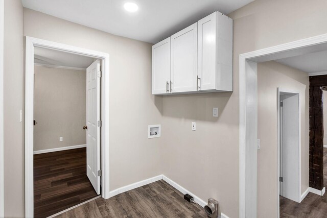 washroom with washer hookup and dark hardwood / wood-style flooring