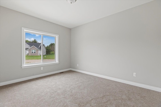 unfurnished room with carpet